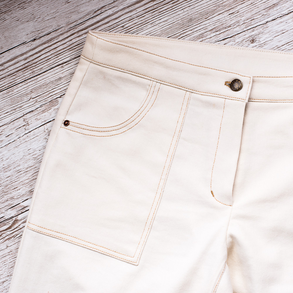 Cream Wide-leg Denim Trousers
Pocket detail